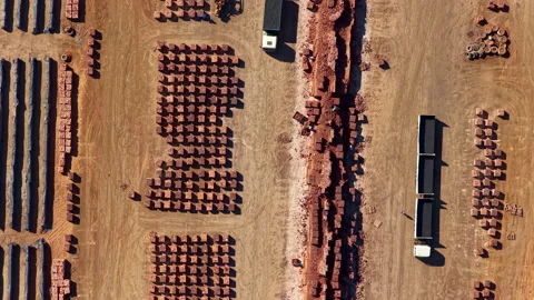 Factory workers hand sorting clay building bricks at brickworks Vídeos de archivo 346116410