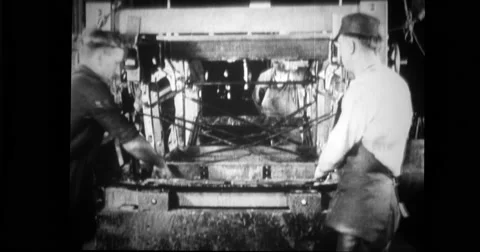 Factory workers lifting the frame Stock Footage
