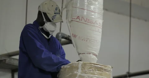 Factory Workers Operating Powder Mixer (4K) Stock Footage 60935880