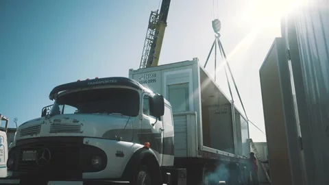 Factory workers, towing crane, and a truck Stock Footage 137526498