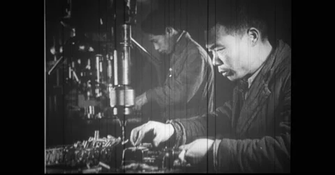 Factory workers working in factory Stock Footage