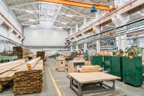 Factory workshop inside interior, Stack of wooden boards in woodworking factory Stock Photos