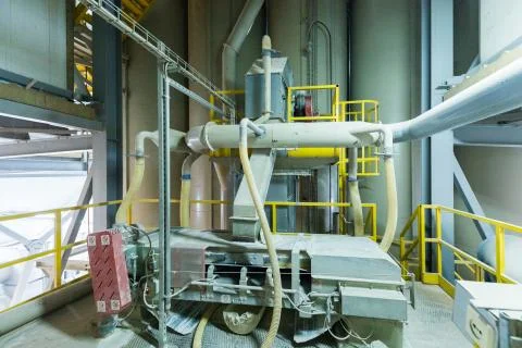 Factory workshop interior and machines on glass production background Foto stock