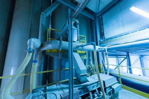 Factory workshop interior and machines on glass production background Foto stock