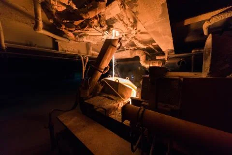 Factory workshop interior and machines on glass production background Foto stock
