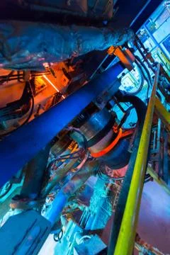Factory workshop interior and machines on glass production background Foto stock