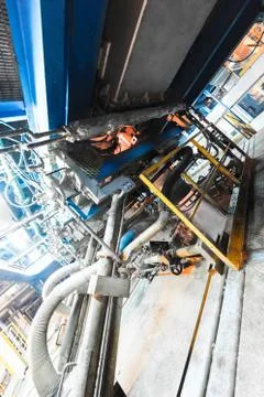 Factory workshop interior and machines on glass production background Foto stock
