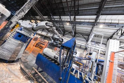 Factory workshop interior and machines on glass production background Foto stock