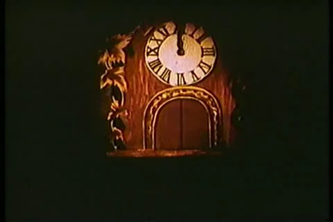 Fade in cuckoo clock on wall Stock Footage 11345091