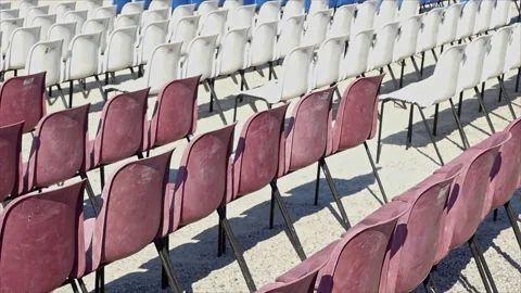 Fade out of some benches placed on a square for an event. Stock Footage 162095677