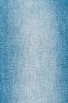 Faded blue denim texture background. Closeup of classic jeans fabric with d.. Stock Photos