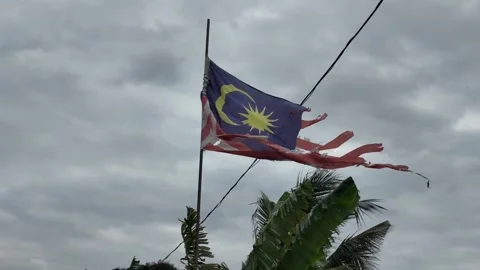 Faded Glory: Malaysian Flag Over Time Stock Footage 327574036