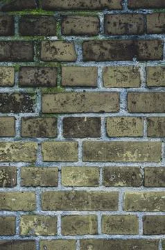 Faded old red brick wall, wide rough vintage texture. Dirty wall with grunge  Stock Photos