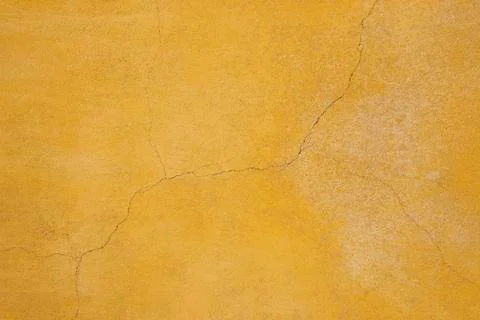 Faded Yellow Rendered Wall Background Texture Foto stock