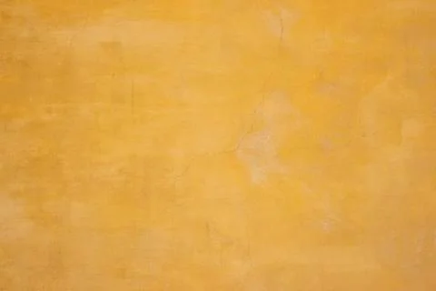 Faded Yellow Rendered Wall Background Texture Foto stock
