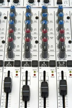 Faders and knobs of sound mixer Stockfoto's