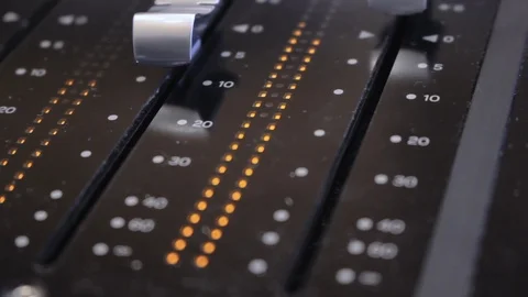 Faders on a sound mixing desk in studio Stock Footage 108543865