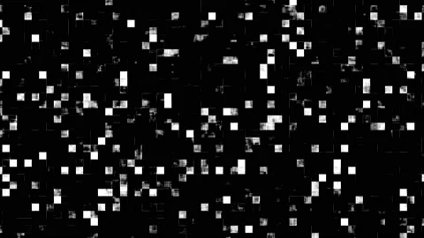 Fading and dimming white pixels on a black screen. Stock Footage 121758001