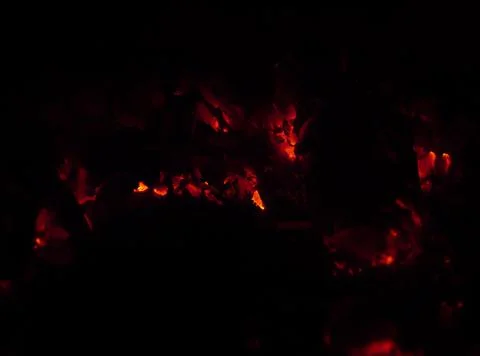 Fading birch coals in the oven Stock Photos
