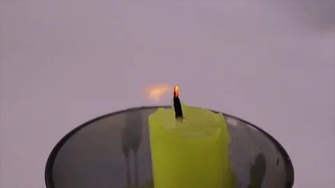 Fading candles on a white background Vídeo Stock 111375670