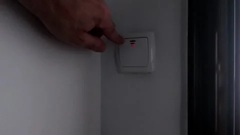 Fading Glow: A Quiet Hand Ends the Hallway’s Evening Light Stock Footage 312866692