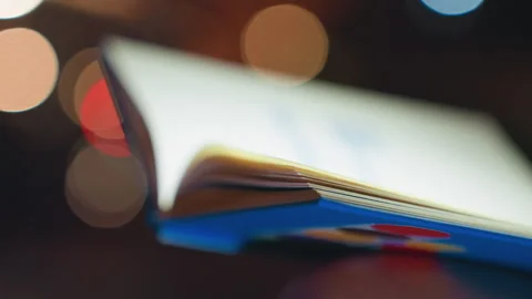 Fading images and gentle visuals. Softly blurred pages with colorful accents Stock Footage 332791609