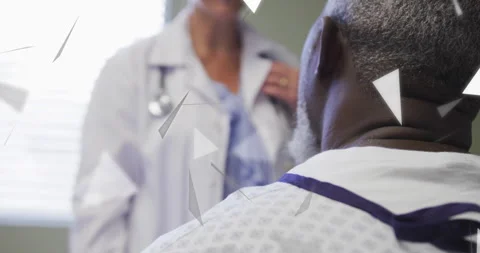 Fading triangles drifting away, revealing medical exam doctor using stethoscope Stock Footage 316088340