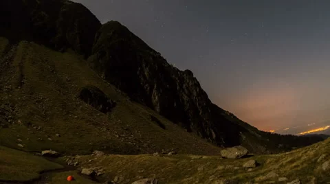 Fagaras mountain valley moon setting orange tent HD Stock Footage 40999084