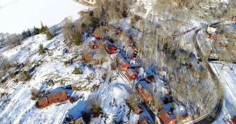 Fagervik, Cinema 4k aerial above red houses, at fagervik steelworks, on a s.. Stock Footage 73183553