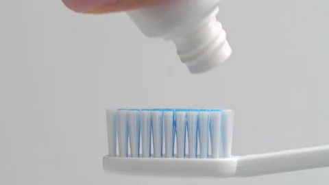 Fail squeeze the toothpaste onto the toothbrush. Stock Footage 92993622