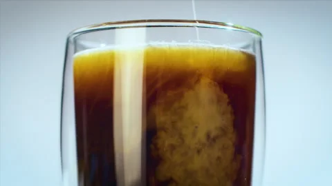 Fail on studio shooting coffee drink, while injecting milk with a syringe. Close Stock Footage 162406388