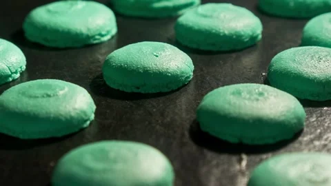 Failed process of baking macarons. Baking green macaroons in electric oven. Video stock 301402594