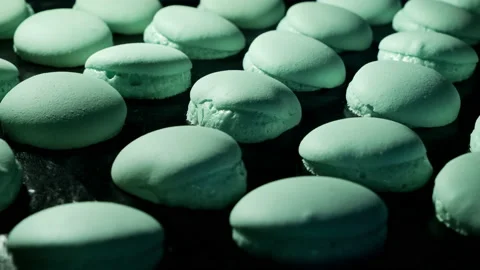 Failure of baking macarons. Baking macaroons in electric oven. Exploded macarons Stock Footage 233784817