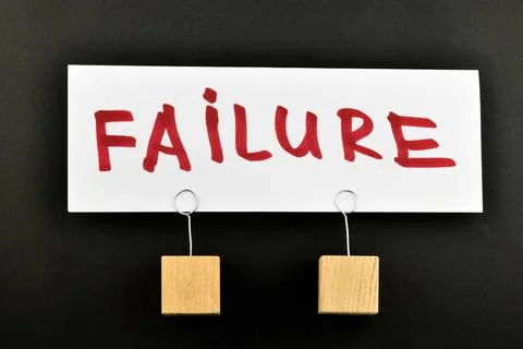 Failure, One big paper note red on black Failure, One big white paper note... 스톡 사진