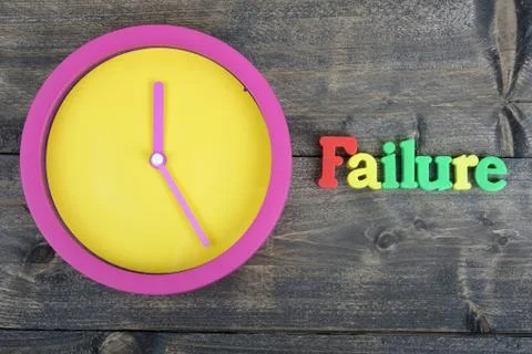 Failure on wooden table Stock Photos