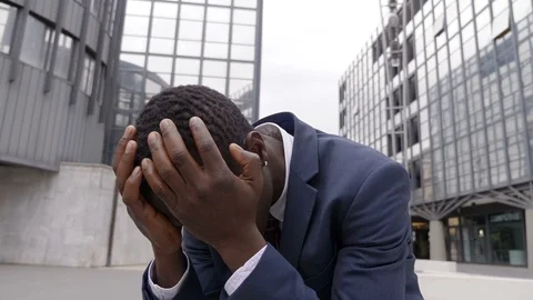 Failure at work, dismissal, despair- Desperate sad fired black businessman Vídeo Stock