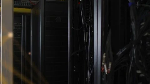 Faint gold nodes appearing left, causing network mesh spreading over racks, Stock Footage 333609653