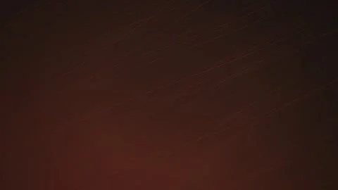 Faint linear patterns shift on a dark surface in a seamless loop Stock Footage 340957195