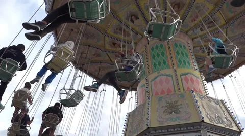 Fair Attraction Ride - Day Time - 02 - Flying Chain Wheel Stock Footage 54675677