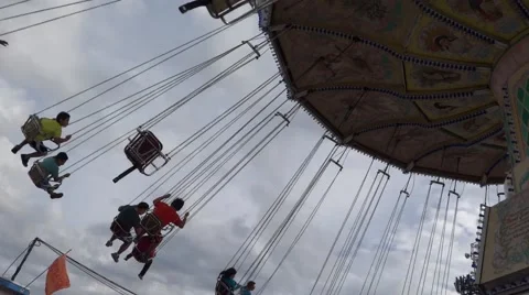 Fair Attraction Ride - Day Time - 04 - Flying Chain Wheel 動画素材 54675877