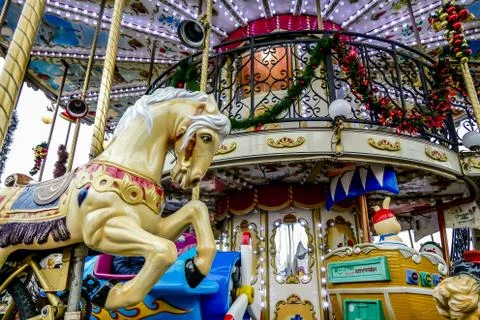 Fair carousel, Photo image a Beautiful panoramic view of Paris Metropolitan C Stock Photos
