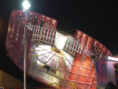 Fair gravity spinning ride Stock Footage