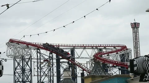 Fair ground ride on an overcast wet day Stock Footage 48355331