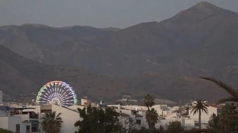 A fair ride during dusk on a warm summer evening Stock Footage 81664756