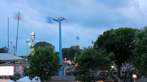Fair Rides and Crowds at Dusk Stock Footage 54645129