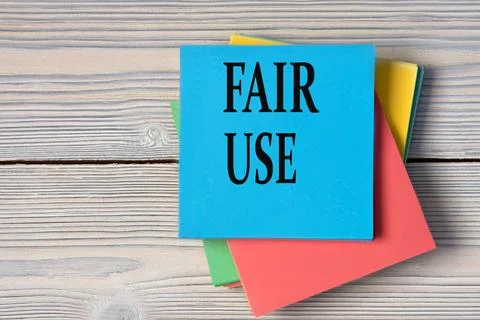 FAIR USE - words on note paper on wooden light background Stock Photos