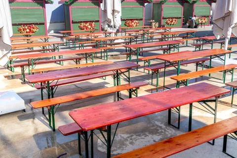 Fairground and empty tables prepared for new year celebrations Stock Photos