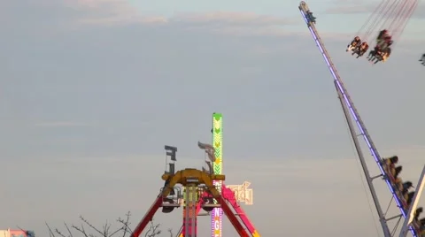 Fairground attractions at sunset. 스톡 동영상 62854996