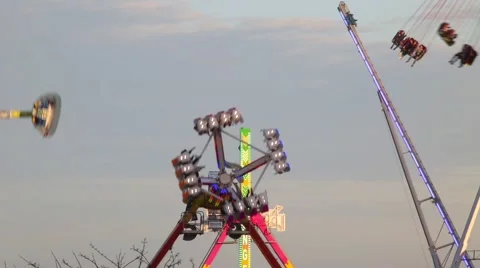 Fairground attractions at sunset. Stock Footage 62855136
