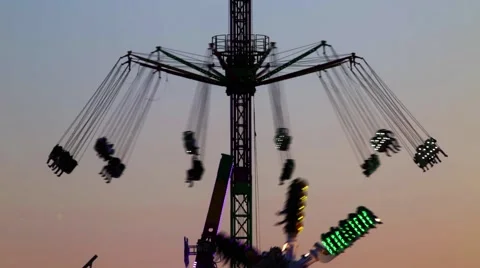 Fairground attractions at sunset. Stock Footage 62865741